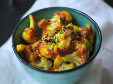 seared cauliflower with tuemeric, tahini and miso